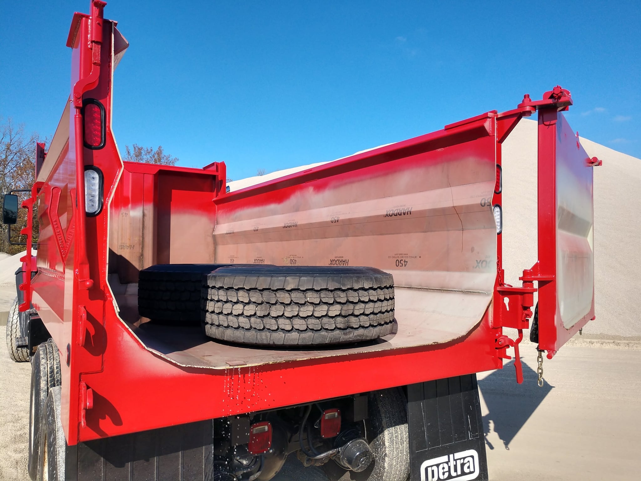 Diamond Elliptical dump body showing lightweight curved design for maximum payload capacity